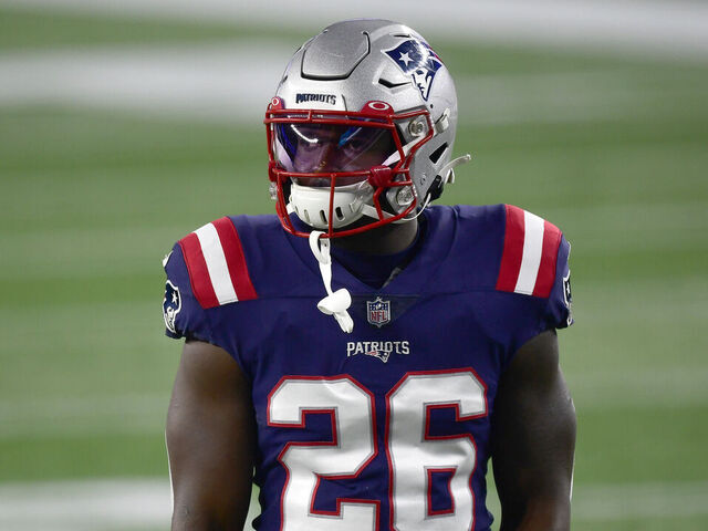 FOXBOROUGH, MA - DECEMBER 28: Sony Michel #26 of the New England Patriots warms up before a game against the Buffalo Bills at Gillette Stadium on December 28, 2020 in Foxborough, Massachusetts.