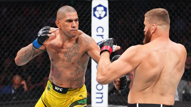SALT LAKE CITY, UTAH - JULY 29: (L-R) Alex Pereira of Brazil punches Jan Blachowicz of Poland in a light heavyweight fight during the UFC 291 event at Delta Center on July 29, 2023 in Salt Lake City, Utah.