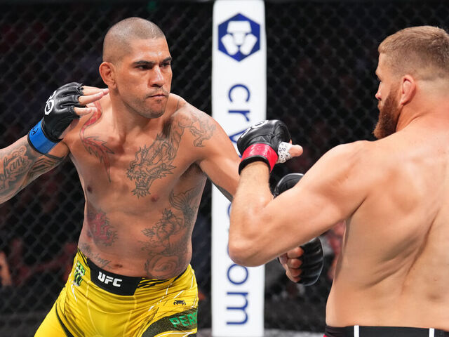 SALT LAKE CITY, UTAH - JULY 29: (L-R) Alex Pereira of Brazil punches Jan Blachowicz of Poland in a light heavyweight fight during the UFC 291 event at Delta Center on July 29, 2023 in Salt Lake City, Utah.