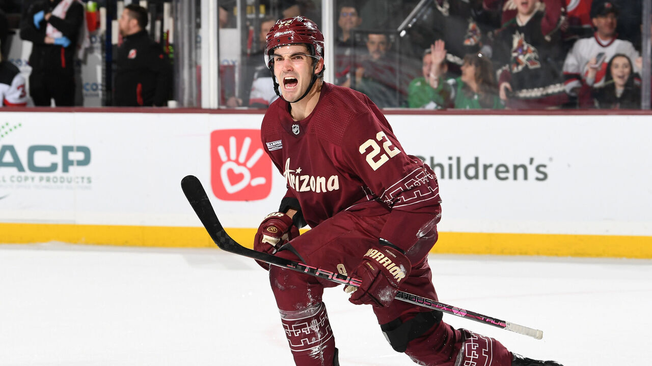 TEMPE, ARIZONA - MARCH 05: Jack McBain #22 of the Arizona Coyotes celebrates after scoring a goal against the New Jersey Devils during the third period at Mullett Arena on March 05, 2023 in Tempe, Arizona.