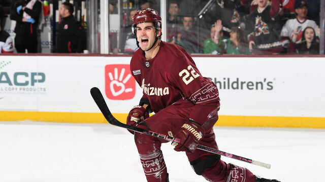 TEMPE, ARIZONA - MARCH 05: Jack McBain #22 of the Arizona Coyotes celebrates after scoring a goal against the New Jersey Devils during the third period at Mullett Arena on March 05, 2023 in Tempe, Arizona.