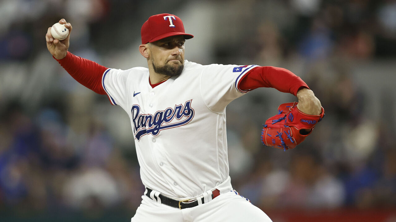 ARLINGTON, TEXAS - JULY 18: Nathan Eovaldi #17 of the Texas Rangers throws a pitch in the third inning against the Tampa Bay Rays at Globe Life Field on July 18, 2023 in Arlington, Texas.