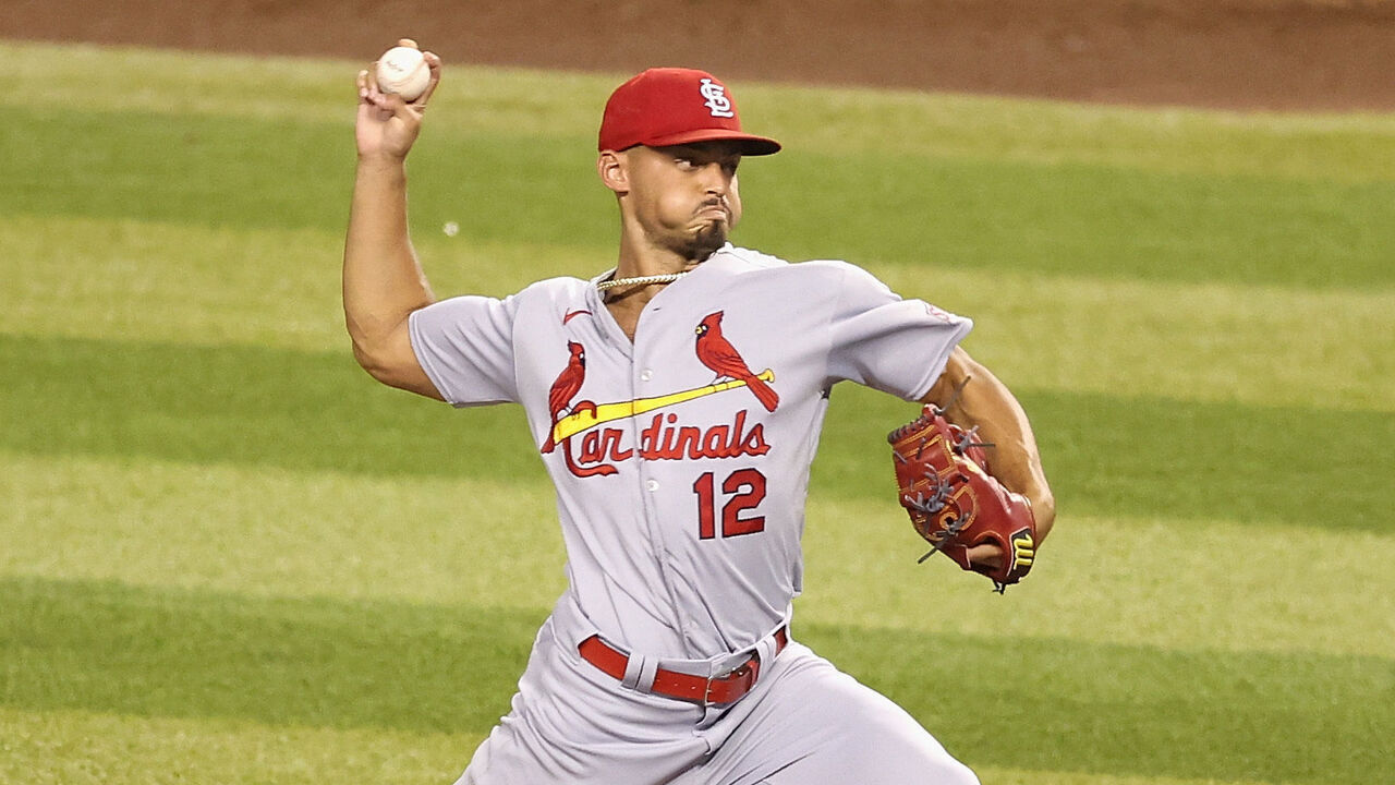 PHOENIX, ARIZONA - JULY 24: Relief pitcher Jordan Hicks #12 of the St. Louis Cardinals pitches against the Arizona Diamondbacks during the MLB game at Chase Field on July 24, 2023 in Phoenix, Arizona. The Cardinals defeated the Diamondbacks 10-6.