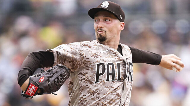 SAN DIEGO, CA - JULY 30: Blake Snell #4 of the San Diego Padres pitches during the second inning of a baseball game against the Texas Rangers on July 30, 2023 at Petco Park in San Diego, California.