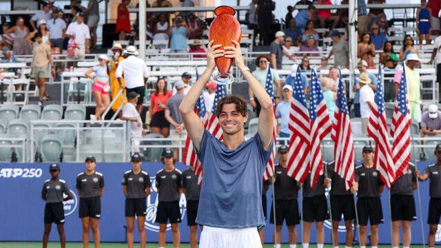 ATLANTA, GEORGIA - JULY 30: Taylor Fritz poses for a photo with the trophy after defeating Aleksandar Vukic of Australia in the ATP Atlanta Open final at Atlantic Station on July 30, 2023 in Atlanta, Georgia.