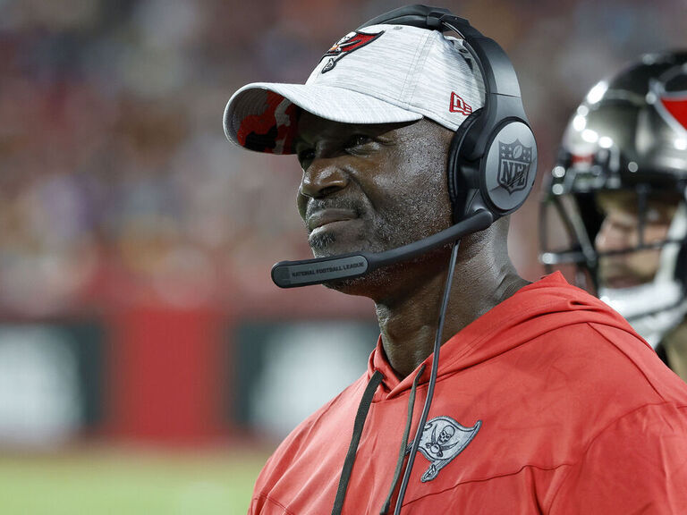 These Cowboys traded in their helmets for a head coach's headset