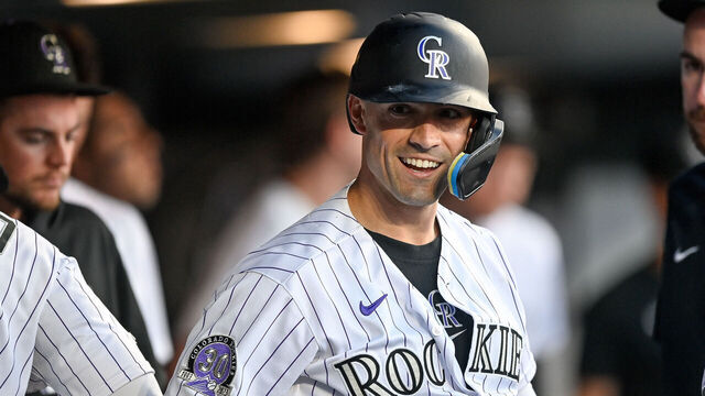 DENVER, CO - JULY 28: Randal Grichuk #15 of the Colorado Rockies celebrates in the dugout after hitting a fourth inning solo home run in a game against the Oakland Athletics at Coors Field on July 28, 2023 in Denver, Colorado.