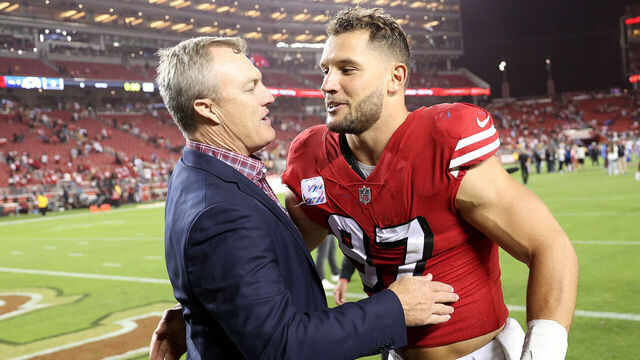 SANTA CLARA, CALIFORNIA - OCTOBER 03: San Francisco 49ers general manager John Lynch congratulates Nick Bosa #97 after they beat the Los Angeles Rams at Levi's Stadium on October 03, 2022 in Santa Clara, California.