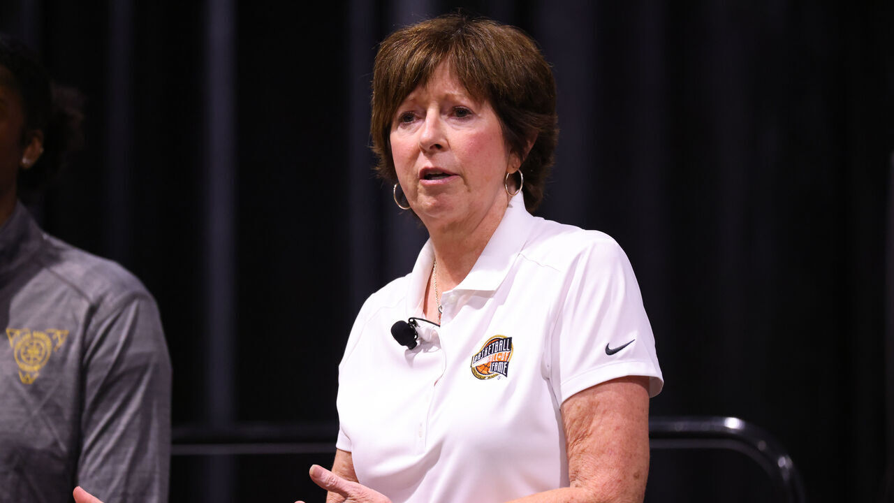 MEMPHIS, TENNESSEE - JULY 30: Muffet McGraw, former head coach of the Notre Dame Fighting Irish, speaks on a panel during the NCAA College Basketball Academy at the Memphis Sports & Events Center on July 30, 2023 in Memphis, Tennessee.
