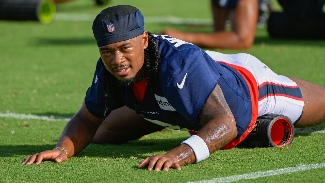 HOUSTON, TX - JULY 26: Houston Texans wide receiver John Metchie III (8) warms up before day 1 of the Texans Training Camp at Houston Methodist Training Center on July 26, 2023, in Houston, Texas.