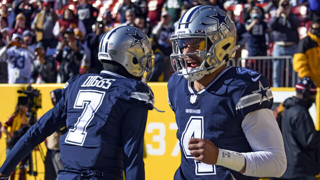LANDOVER, MD - DECEMBER 12: Dallas Cowboys quarterback Dak Prescott (4) takes the field with cornerback Trevon Diggs (7) for the NFL game between the Dallas Cowboys and the Washington Football Team on December 12, 2021 at Fed Ex Field in Landover, MD.