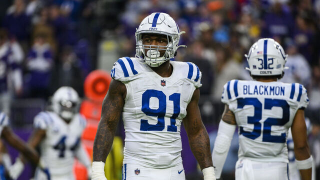 MINNEAPOLIS, MN - DECEMBER 17: Yannick Ngakoue #91 of the Indianapolis Colts stands between plays in the fourth quarter of the game against the Minnesota Vikings at U.S. Bank Stadium on December 17, 2022 in Minneapolis, Minnesota.