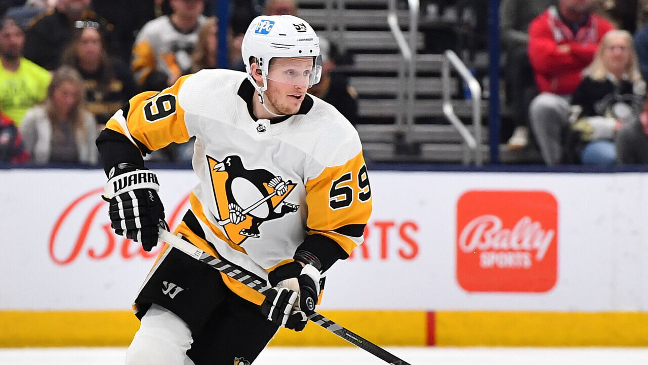 COLUMBUS, OHIO - APRIL 13: Jake Guentzel #59 of the Pittsburgh Penguins skates with the puck during the overtime period of a game against the Columbus Blue Jackets at Nationwide Arena on April 13, 2023 in Columbus, Ohio.