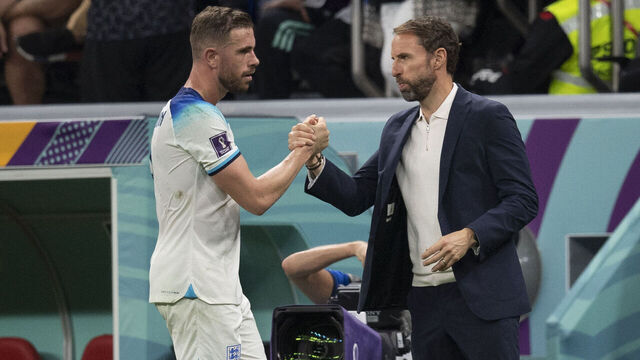 AL KHOR, QATAR - DECEMBER 04: Jordan Henderson of England is greeted by manager Gareth Southgate after being substituted during the FIFA World Cup Qatar 2022 Round of 16 match between England and Senegal at Al Bayt Stadium on December 4, 2022 in Al Khor, Qatar.