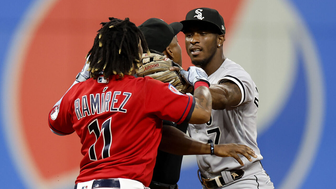 CLEVELAND, OH - AUGUST 05: Jose Ramirez #11 of the Cleveland Guardians and Tim Anderson #7 of the Chicago White Sox start to fight as umpire Malachi Moore #44 gets between them during the sixth inning at Progressive Field on August 05, 2023 in Cleveland, Ohio.