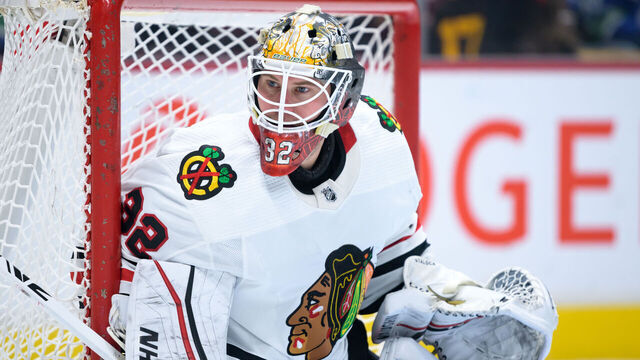 VANCOUVER, CANADA - APRIL 6: Alex Stalock #32 of the Chicago Blackhawks in net during the first period of their NHL game against the Vancouver Canucks at Rogers Arena on April 6, 2023 in Vancouver, British Columbia, Canada.