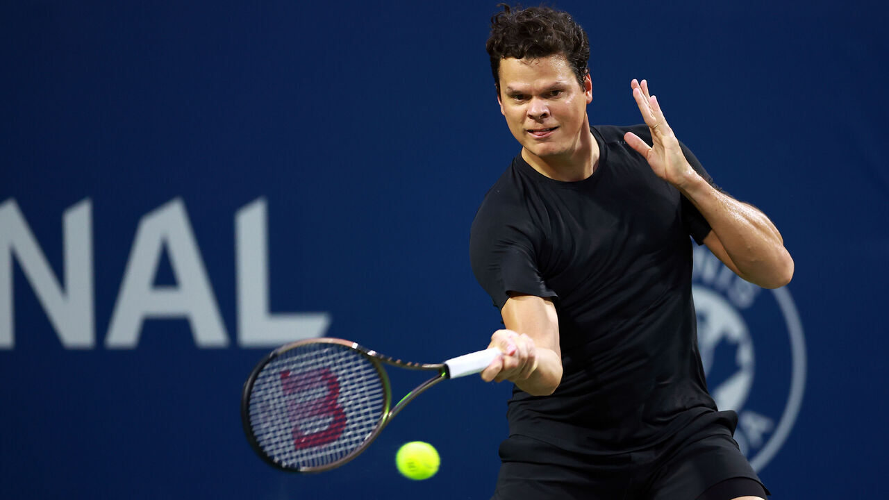 TORONTO, ON - AUGUST 7: Milos Raonic of Canada hits a shot against Frances Tiafoe of the United States during Day One of the National Bank Open, part of the Hologic ATP Tour, at Sobeys Stadium on August 7, 2023 in Toronto, Canada.