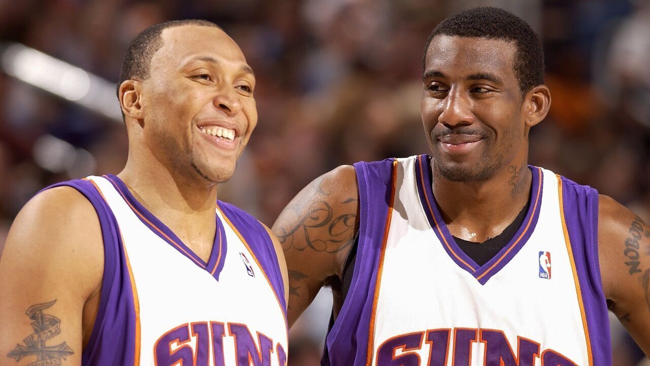 PHOENIX - NOVEMBER 23: Shawn Marion #31 and Amare Stoudemire #1 of the Phoenix Suns share a laugh during the game against the Los Angeles Clippers on November 23, 2007 at US Airways Center in Phoenix, Arizona. The Suns won 113-94. NOTE TO USER: User expressly acknowledges and agrees that, by downloading and/or using this Photograph, user is consenting to the terms and conditions of the Getty Images License Agreement. Mandatory Copyright Notice: Copyright 2007 NBAE