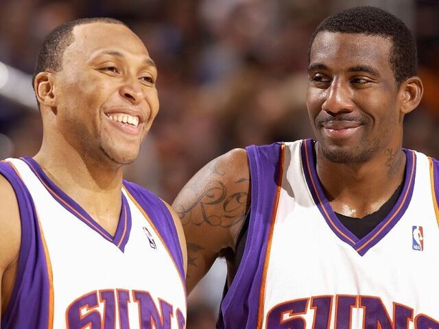PHOENIX - NOVEMBER 23: Shawn Marion #31 and Amare Stoudemire #1 of the Phoenix Suns share a laugh during the game against the Los Angeles Clippers on November 23, 2007 at US Airways Center in Phoenix, Arizona. The Suns won 113-94. NOTE TO USER: User expressly acknowledges and agrees that, by downloading and/or using this Photograph, user is consenting to the terms and conditions of the Getty Images License Agreement. Mandatory Copyright Notice: Copyright 2007 NBAE