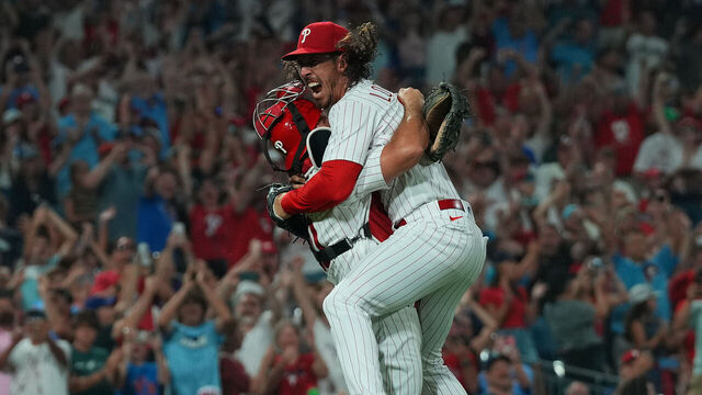 PHILADELPHIA, PENNSYLVANIA - AUGUST 9: Michael Lorenzen (R) #22 of the Philadelphia Phillies celebrates with J.T. Realmuto #10 after throwing a no-hitter against the Washington Nationals at Citizens Bank Park on August 9, 2023 in Philadelphia, Pennsylvania. The Phillies defeated the Nationals 7-0.