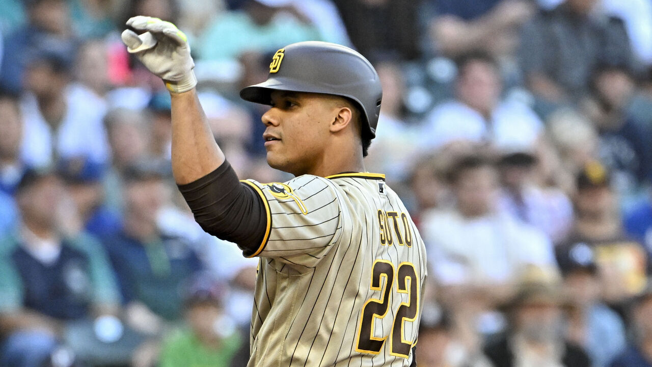 SEATTLE, WASHINGTON - AUGUST 08: Juan Soto #22 of the San Diego Padres tosses a ball during the first inning against the Seattle Mariners at T-Mobile Park on August 08, 2023 in Seattle, Washington.