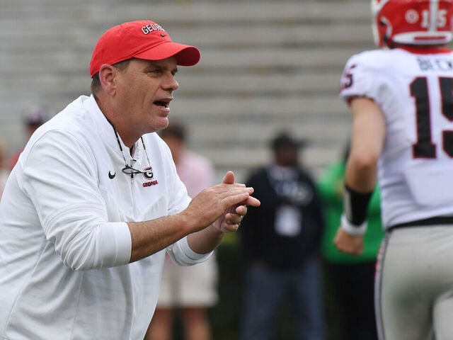 ATHENS, GA - APRIL 15: Georgia Bulldogs offensive coordinator Mike Bobo conducts a drill before the Georgia G-Day Red and Black Spring Game on April 15, 2023, at Sanford Stadium in Athens, GA.
