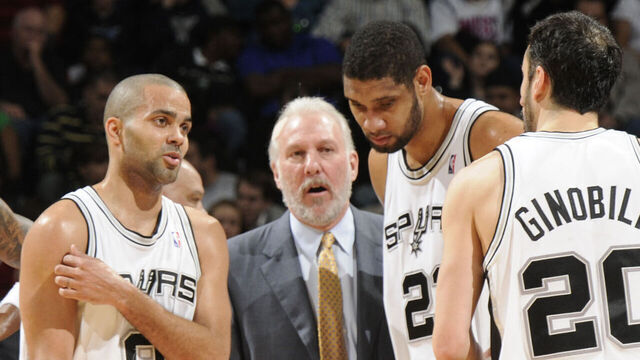 SAN ANTONIO - JANUARY 31: Gregg Popovich Head Coach of the San Antonio Spurs talks to his team, Roger Mason Jr #8, Tony Parker #9, Tim Duncan #21, Manu Ginobili #20 and Bruce Bowen #12 during a time out against the New Orleans Hornets on January 31, 2009 at the AT&T Center in San Antonio, Texas. NOTE TO USER: User expressly acknowledges and agrees that, by downloading and/or using this Photograph, user is consenting to the terms and conditions of the Getty Images License Agreement. Mandatory Copyright Notice: Copyright 2009 NBAE