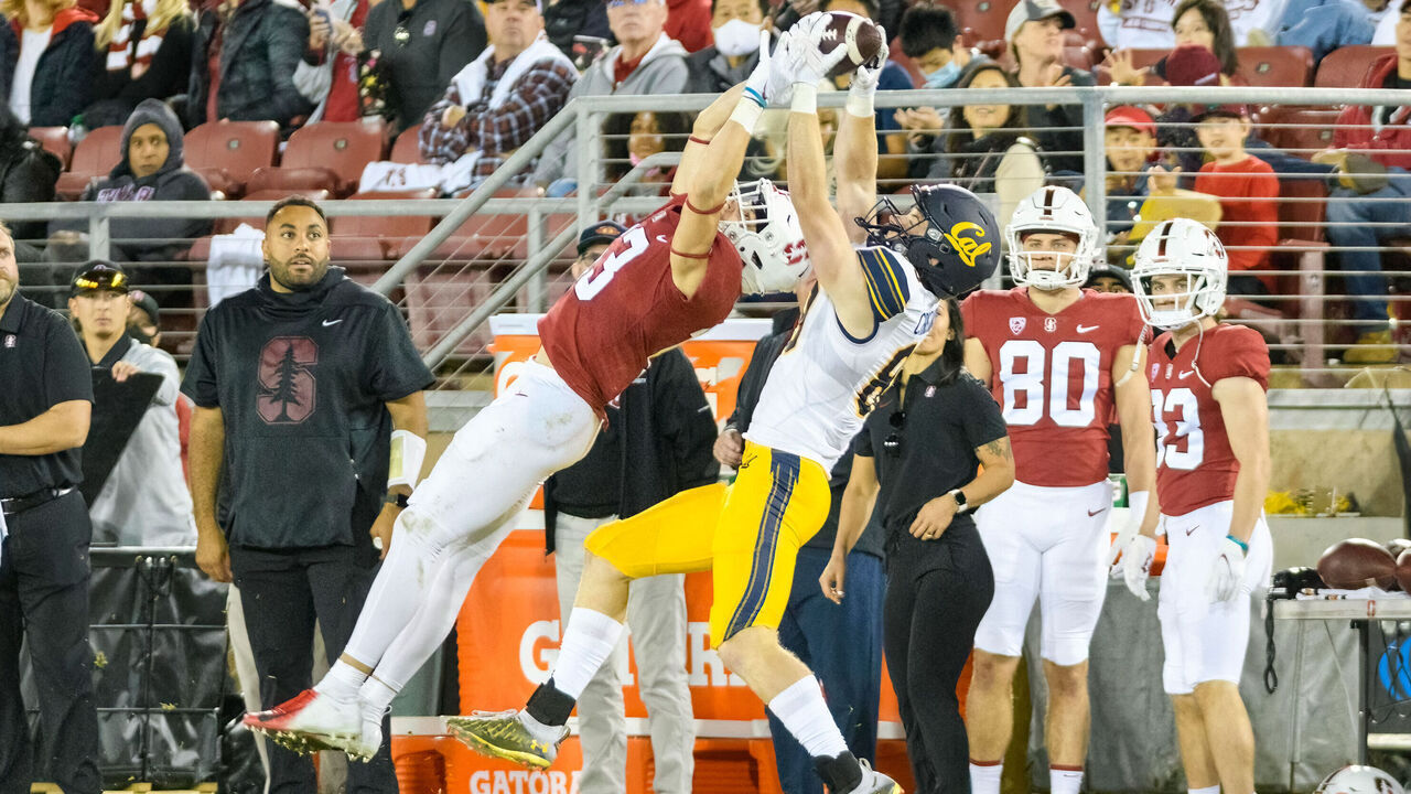 PALO ALTO, CA - NOVEMBER 20: California Golden Bears wide receiver Tommy Christakos (89) takes control of a pass reception from Stanford Cardinal cornerback Ethan Bonner (13) during the game between the Cal Golden Bears and the Stanford Cardinal on Saturday, November 20, 2021 at Stanford Stadium in Palo Alto, California.