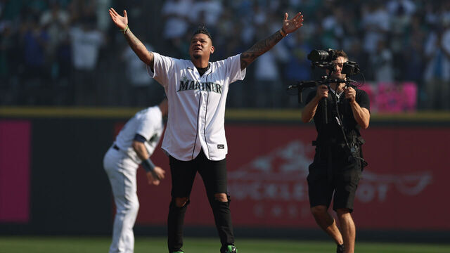 SEATTLE, WASHINGTON - OCTOBER 15: Former Seattle Mariners Felix Hernandez throws out the first pitch in game three of the American League Division Series against the Houston Astros at T-Mobile Park on October 15, 2022 in Seattle, Washington.