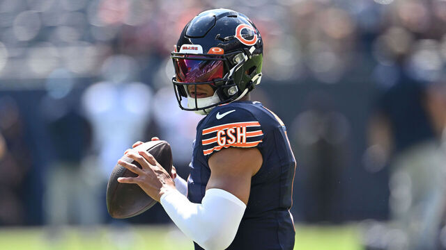 CHICAGO, ILLINOIS - AUGUST 12: Justin Fields #1 of the Chicago Bears warms up before the preseason game against the Tennessee Titans at Soldier Field on August 12, 2023 in Chicago, Illinois.