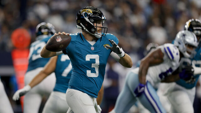 ARLINGTON, TX - AUGUST 12: Jacksonville Jaguars quarterback C.J. Beathard (3) looks for an open receiver during the preseason game between the Dallas Cowboys and the Jacksonville Jaguars on August 12, 2023 at AT&T Stadium in Arlington, Texas.