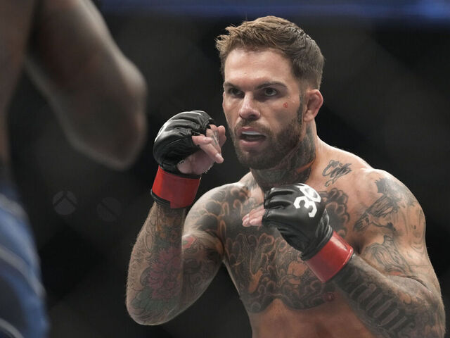 LAS VEGAS, NV - MARCH 4: (R-L) Cody Garbrandt battles Trevin Jones in their Bantamweight fight during the UFC 285 event at T-Mobile Arena on March 4, 2023 in Las Vegas, NV, USA.
