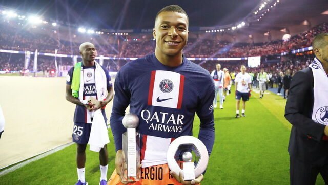 PARIS, FRANCE - JUNE 03: Kylian Mbappe of Paris Saint-Germain celebrates the championship trophy after the Ligue 1 match between Paris Saint-Germain and Clermont Foot at Parc des Princes on June 03, 2023 in Paris, France.