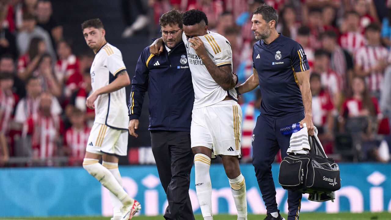 BILBAO, SPAIN - AUGUST 12: Eder Militao of Real Madrid CF leaves injured on the pitch during the LaLiga EA Sports match between Athletic Club and Real Madrid CF at Estadio de San Mames on August 12, 2023 in Bilbao, Spain.