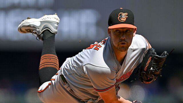 SEATTLE, WASHINGTON - AUGUST 13: Kyle Bradish #39 of the Baltimore Orioles throws a pitch during the first inning against the Seattle Mariners at T-Mobile Park on August 13, 2023 in Seattle, Washington.