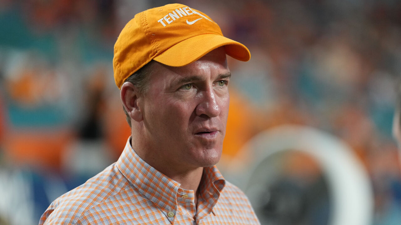 MIAMI GARDENS, FL - DECEMBER 30: NFL great Peyton Manning makes an appearance ion the sidelines before the Capital One Orange Bowl game between the Tennessee Volunteers and the Clemson Tigers on Friday, December 20, 2022 at Hard Rock Stadium, Miami Gardens, Fla.