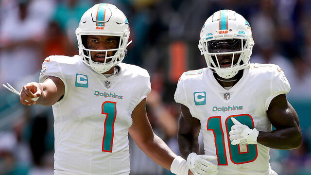 MIAMI GARDENS, FLORIDA - SEPTEMBER 25: Tua Tagovailoa #1 and Tyreek Hill #10 of the Miami Dolphins in action during the first half of the game against the Buffalo Bills at Hard Rock Stadium on September 25, 2022 in Miami Gardens, Florida.