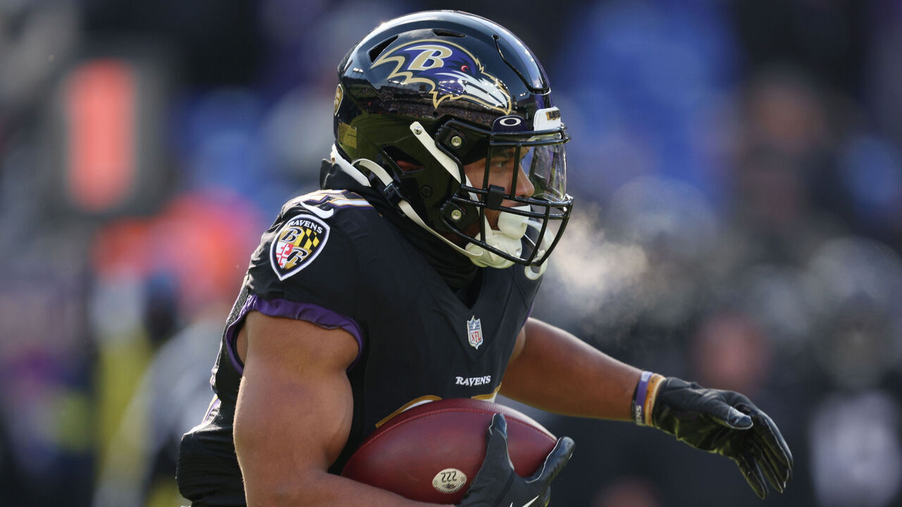 BALTIMORE, MARYLAND - DECEMBER 24: J.K. Dobbins #27 of the Baltimore Ravens carries the ball during the first quarter of the game against the Atlanta Falcons at M&T Bank Stadium on December 24, 2022 in Baltimore, Maryland.