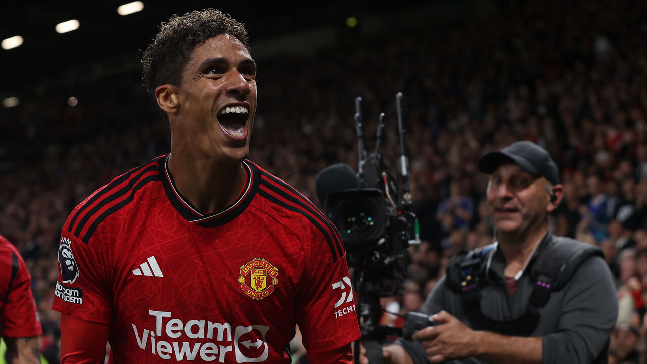 MANCHESTER, ENGLAND - AUGUST 14: Raphael Varane of Manchester United celebrates scoring their first goal during the Premier League match between Manchester United and Wolverhampton Wanderers at Old Trafford on August 14, 2023 in Manchester, England.