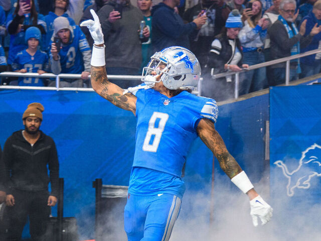 DETROIT, MI - DECEMBER 04: Detroit Lions wide receiver Josh Reynolds (8) runs in during pregame introductions for the Detroit Lions versus the Jacksonville Jaguars game on Sunday December 4, 2022 at Ford Field in Detroit, MI.
