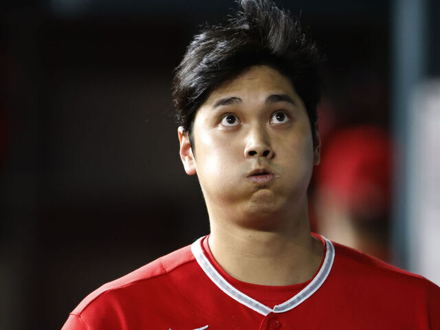 ARLINGTON, TX - AUGUST 14: Shohei Ohtani #17 of the Los Angeles Angels reacts after striking out against the Texas Rangers during the fourth inning at Globe Life Field on August 14, 2023 in Arlington, Texas.