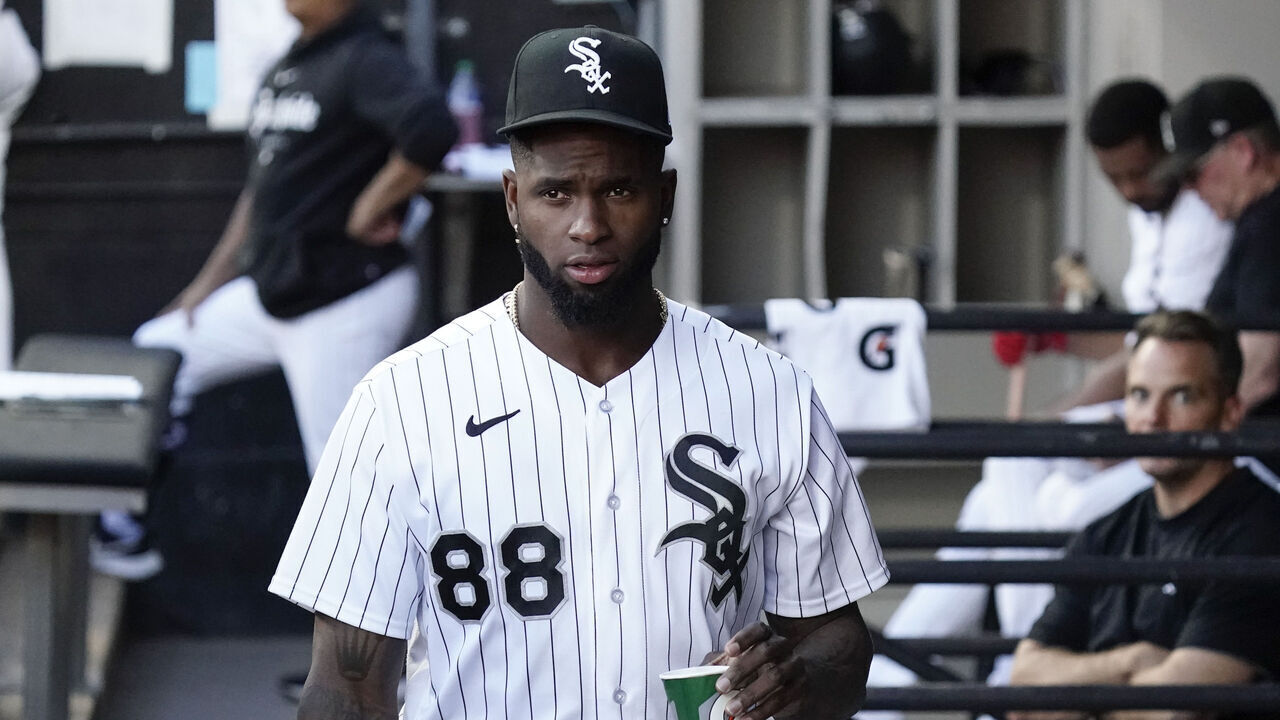CHICAGO, ILLINOIS - AUGUST 12: Luis Robert Jr. #88 of the Chicago White Sox stands in the dugout during a game against the Milwaukee Brewers at Guaranteed Rate Field on August 12, 2023 in Chicago, Illinois.