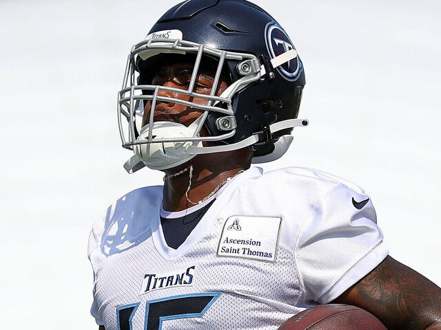 Photos from Titans' first padded practice of training…