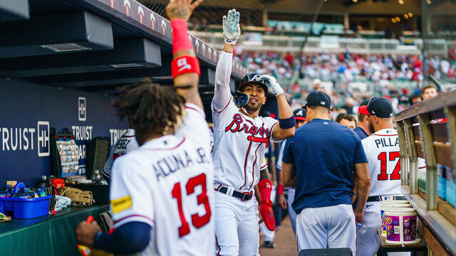 ATLANTA, GA - AUGUST 16: Eddie Rosario #8 of the Atlanta Braves celebrates after hitting a home run in the second inning during the game against the New York Yankees at Truist Park on August 16, 2023 in Atlanta, Georgia.