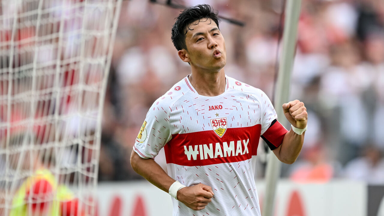 REUTLINGEN, GERMANY - AUGUST 12: Wataru Endo of VfB Stuttgart gestures, celebrates after scoring his team's fourth goal during the DFB cup first round match between TSG Balingen and VfB Stuttgart at Stadion an der Kreuzeiche on August 12, 2023 in Reutlingen, Germany.