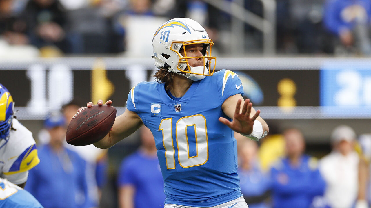 INGLEWOOD, CA - JANUARY 01: Los Angeles Chargers quarterback Justin Herbert (10) passes the ball during an NFL regular season game between the Los Angeles Rams and the Los Angeles Chargers on January 01, 2023, at SoFi Stadium in Inglewood, CA.