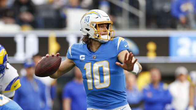 INGLEWOOD, CA - JANUARY 01: Los Angeles Chargers quarterback Justin Herbert (10) passes the ball during an NFL regular season game between the Los Angeles Rams and the Los Angeles Chargers on January 01, 2023, at SoFi Stadium in Inglewood, CA.