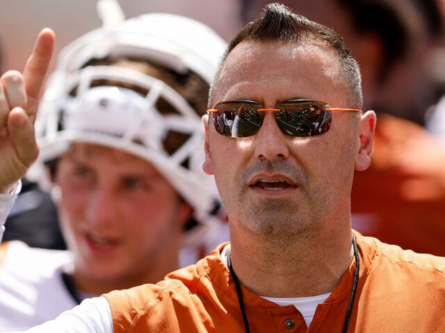 AUSTIN, TEXAS - APRIL 15: Head coach Steve Sarkisian of the Texas Longhorns stands for the playing of The Eyes of Texas after the Texas Football Orange-White Spring Football Game at Darrell K Royal-Texas Memorial Stadium on April 15, 2023 in Austin, Texas.