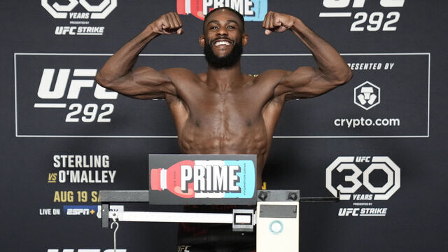 BOSTON, MASSACHUSETTS - AUGUST 18: Aljamain Sterling poses on the scale during the UFC 292 official weigh-in at the Hyatt Regency on August 18, 2023 in Boston, Massachusetts.