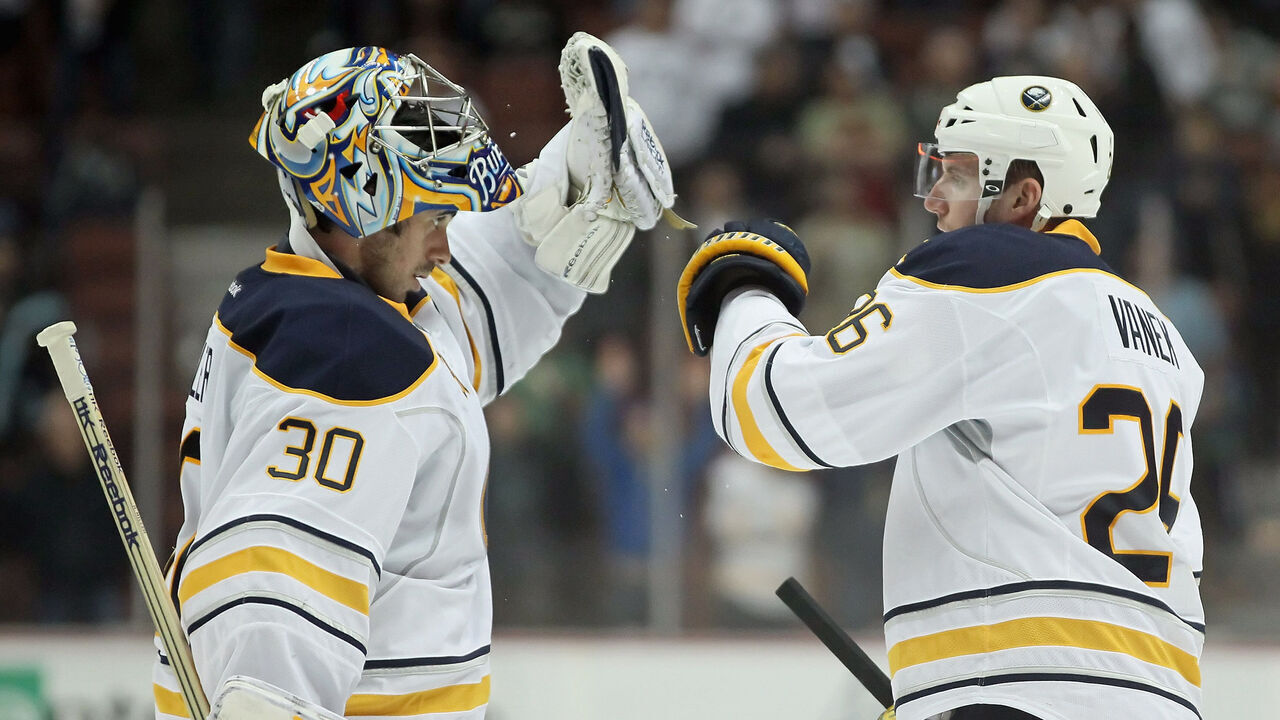 ANAHEIM, CA - FEBRUARY 29: Goaltender Ryan Miller #30 of the Buffalo Sabres is congratulated by Thomas Vanek #26 after shuting out the Anaheim Ducks 2-0 at Honda Center on February 29, 2012 in Anaheim, California.
